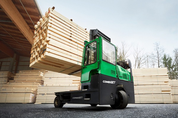 Forklift carrying timber